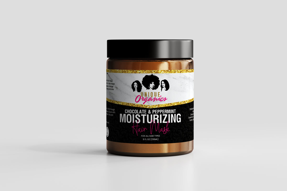 Jar of moisturizing hair mask with a black and gold label on a light gray background